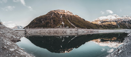 Mountain with a lake in front of it.